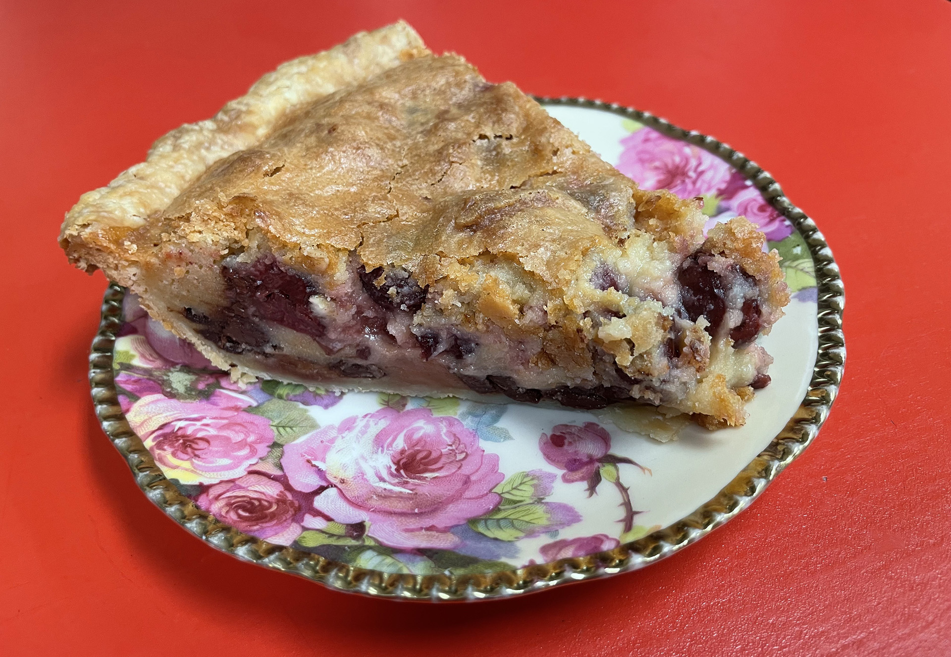 Slice of cherry lavender pie